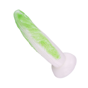 A novelty realistic dildo made to look like a cabbage or lettuce stalk, featuring a textured light green inner section and a smooth white outer layer with a rounded white base, shown on a plain white background.